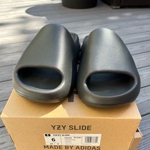 Authentic brand new Yeezy black slides size 6.
